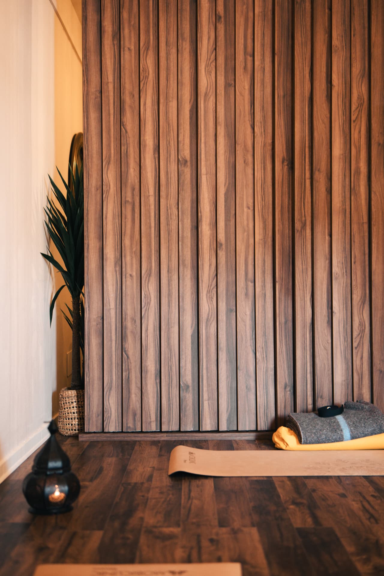 Yoga corner with wooden partition